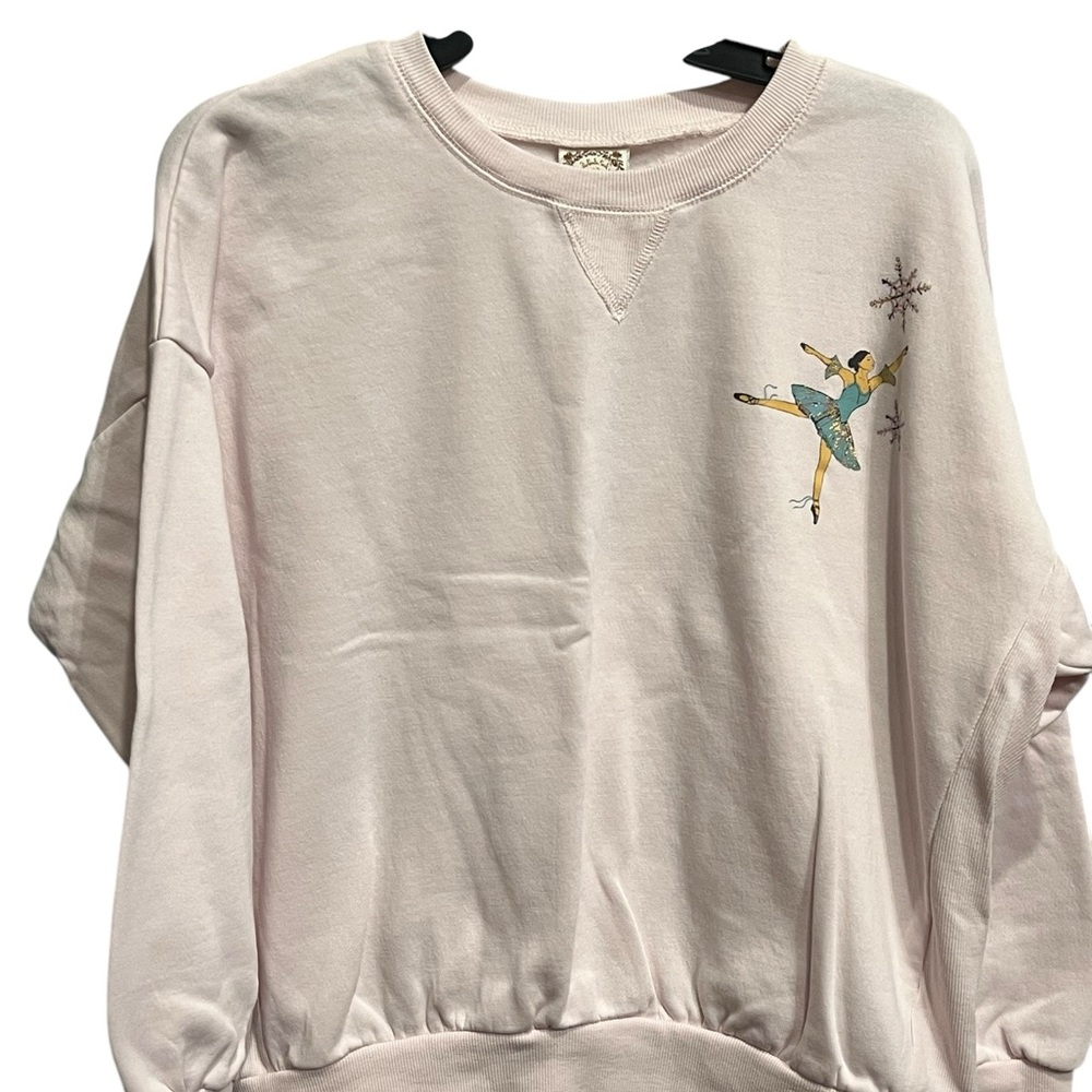Light Pink Nutcracker Sweatshirt with Ice Skater Design